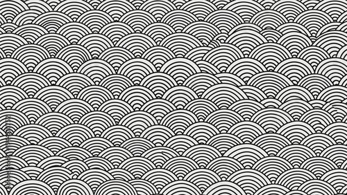 Traditional Japanese seamless wave pattern also known as Seigaiha in black and white line art style for elegant backgrounds.