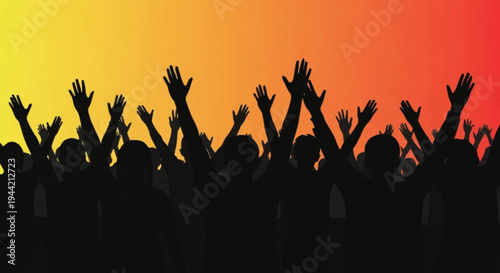 Crowd of people with hands raised in excitement.