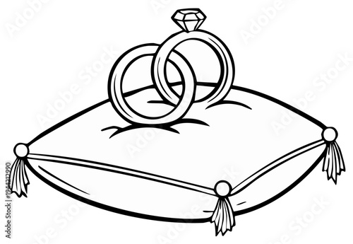 Two interlocking wedding rings with a diamond resting on a decorative cushion