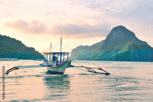 PALAWAN, PHILIPPINES - DECEMBER 21, 2023: Tropical islands  in El Nido on Palawan Island in the Philippines. 6 million tourists visited Philippines in 2016. On a hot sunny afternoon. Beautiful scenery
