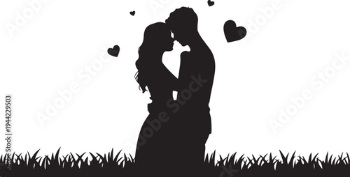 Silhouette of a couple embracing with hearts and grass