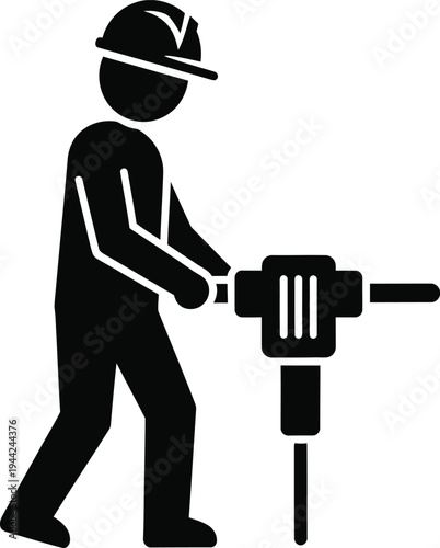 Construction worker operating a jackhammer