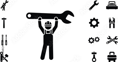Mechanic holding large adjustable wrench with various tools