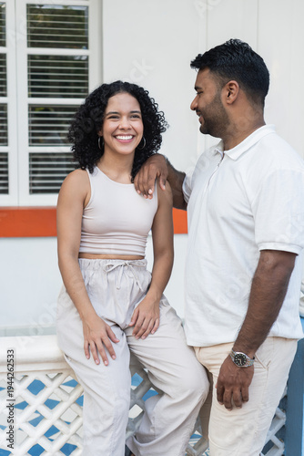Happy young couple smiling together outdoors