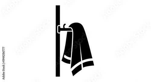 Black and white icon of a towel hanging on a towel rack