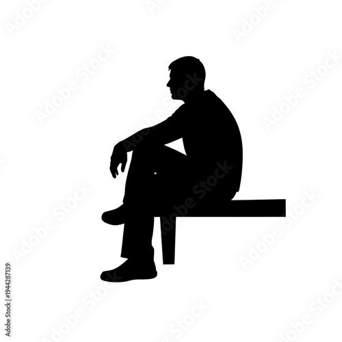 Man Sitting on Bench in Silhouette.