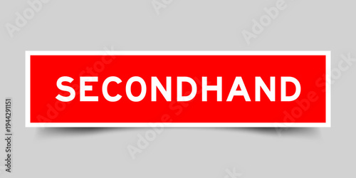 Red color square shape sticker label with word secondhand on gray background