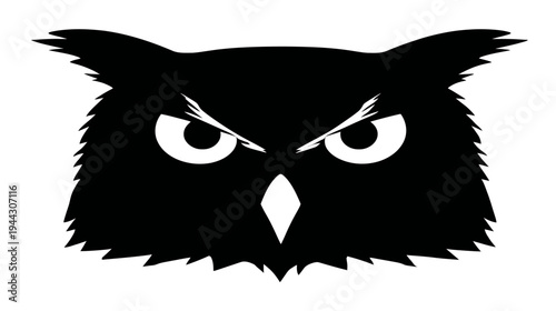 A striking black and white design of a stylized owl's face with intense eyes