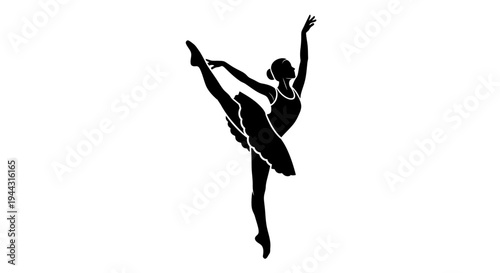 Silhouette of a female ballet dancer.
