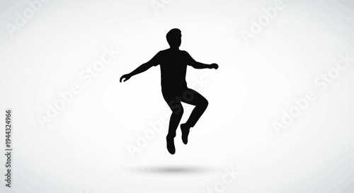 Silhouette of a man jumping.