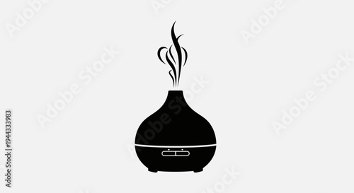 Black aromatherapy diffuser emitting steam, isolated on a light grey background