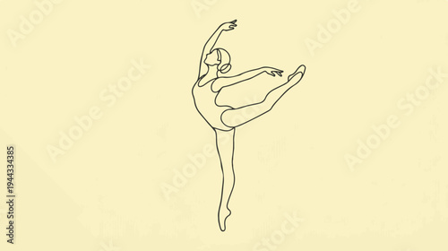 Elegant ballerina gracefully performing a ballet pose with poise and skill.