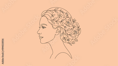 Elegant womans profile with floral hair design on peach background.