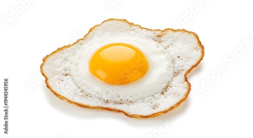 A fried egg with a runny yolk on a white background, perfectly cooked and presented