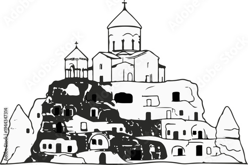 Ancient cave dwellings integrated with a multi-domed church on a rocky outcrop