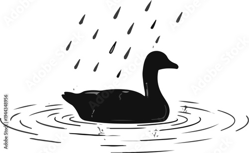 Black bird floats on rippling water with raindrops falling