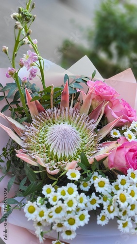 Luxury Bouquet with King Protea Pink Roses and Chamomile Flowers Close Up