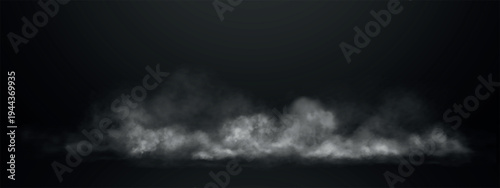 Atmospheric smoke and fog drifting over black floor. Misty clouds creating mysterious background textures for night scenes