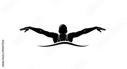Silhouette of a Swimmer Performing Butterfly Stroke in Water