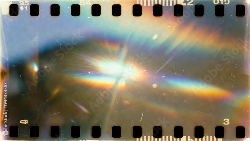 Film strip with prism light streaks and sunburst reflections