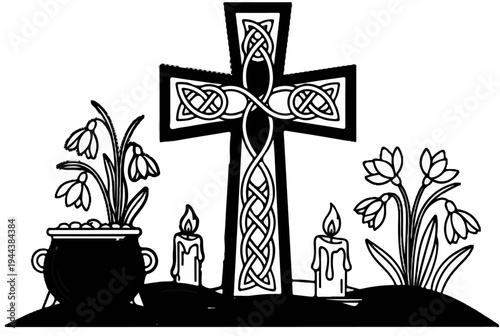 Celtic cross with snowdrops, candles and cauldron create a solemn scene
