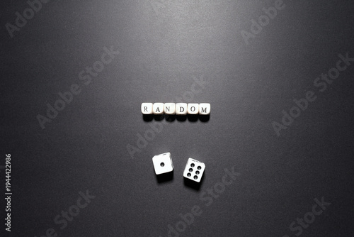 Foto Random word above dice symbolizing unpredictability, data randomness, and uncertain outcomes