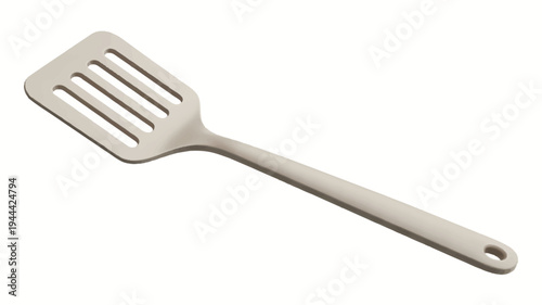 A single light gray spatula isolated on a plain white background