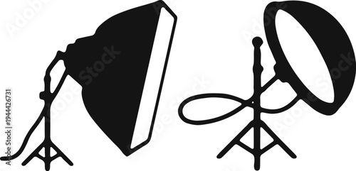 Photography lighting equipment including softbox and umbrella light reflectors on tripods