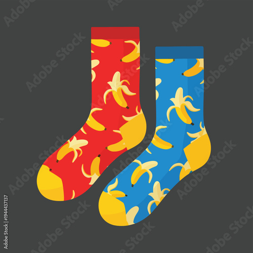 Pair of colorful socks one red and one blue both featuring a pattern of peeled bananas expressing playful and quirky fashion
