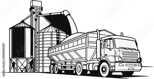 Grain loading into a large truck from industrial silos