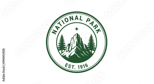 Circular National Park logo with a stylized green mountain peak, two pine trees, and a star, featuring 'NATIONAL PARK' text and 'EST. 1916' on a white background.