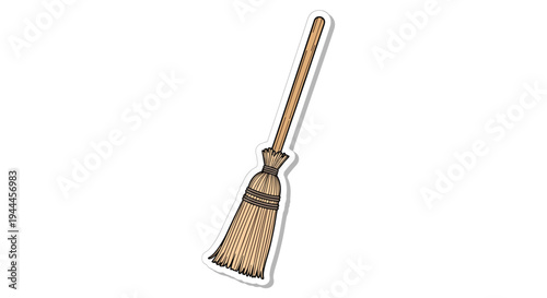 Classic witches broomstick with a long wooden handle and straw bristles is depicted as a sticker with a white border.