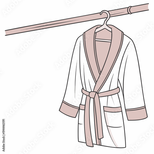 A white bathrobe with pink trim and belt