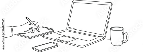 Hand holding stylus drawing on tablet next to laptop and coffee cup