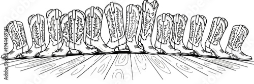 A line of western cowboy boots with decorative stitching on a wooden floor
