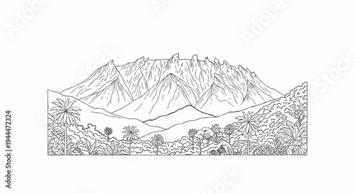 Mountain range with jagged peaks and a lush tropical foreground