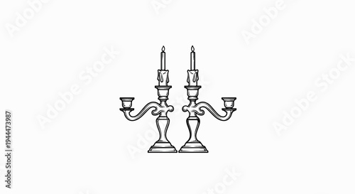 Ornate candelabras with lit candles, elegant vintage design