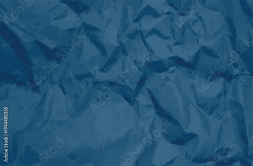 Abstract background of crumpled dark blue paper texture with sharp creases and shadows