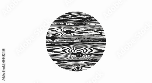 Oval shaped black and white wood grain pattern with knots