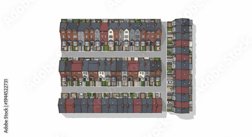 Aerial view of a suburban street with rows of townhouses and cars