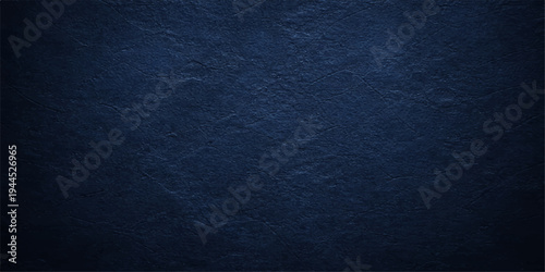 Dark blue grunge fabric texture background with rough denim textile pattern and vintage surface design