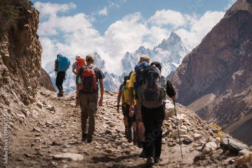 Group of trekkers hiking on baltoro trek karakoram mountains. Baltoro