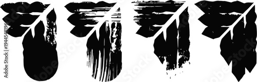 Set of black ink brush stroke leaves silhouettes with various textures and rough edges