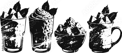 Four dessert cups with whipped cream, chocolate, and fruit toppings in various glassware