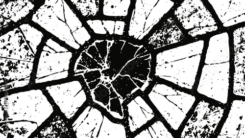 Shattered glass with cracked center and fragmented irregular pieces spreading outward