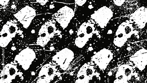 Grunge black and white skull pattern with distressed texture and scattered splatters