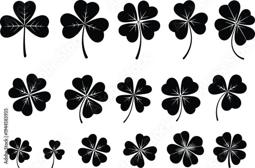 Black and white shamrock with varying leaf shapes and stems on a white background