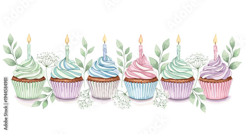 Colorful birthday cupcakes with candles and floral decoration