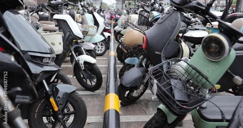 Electric scooters parked near the exit of subway station,Shenzhen, Guangdong, China