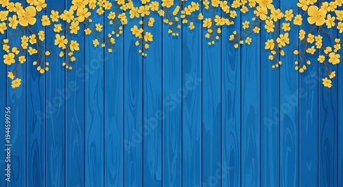 Delicate yellow blossoms adorning a vibrant blue wooden plank background creating a decorative border